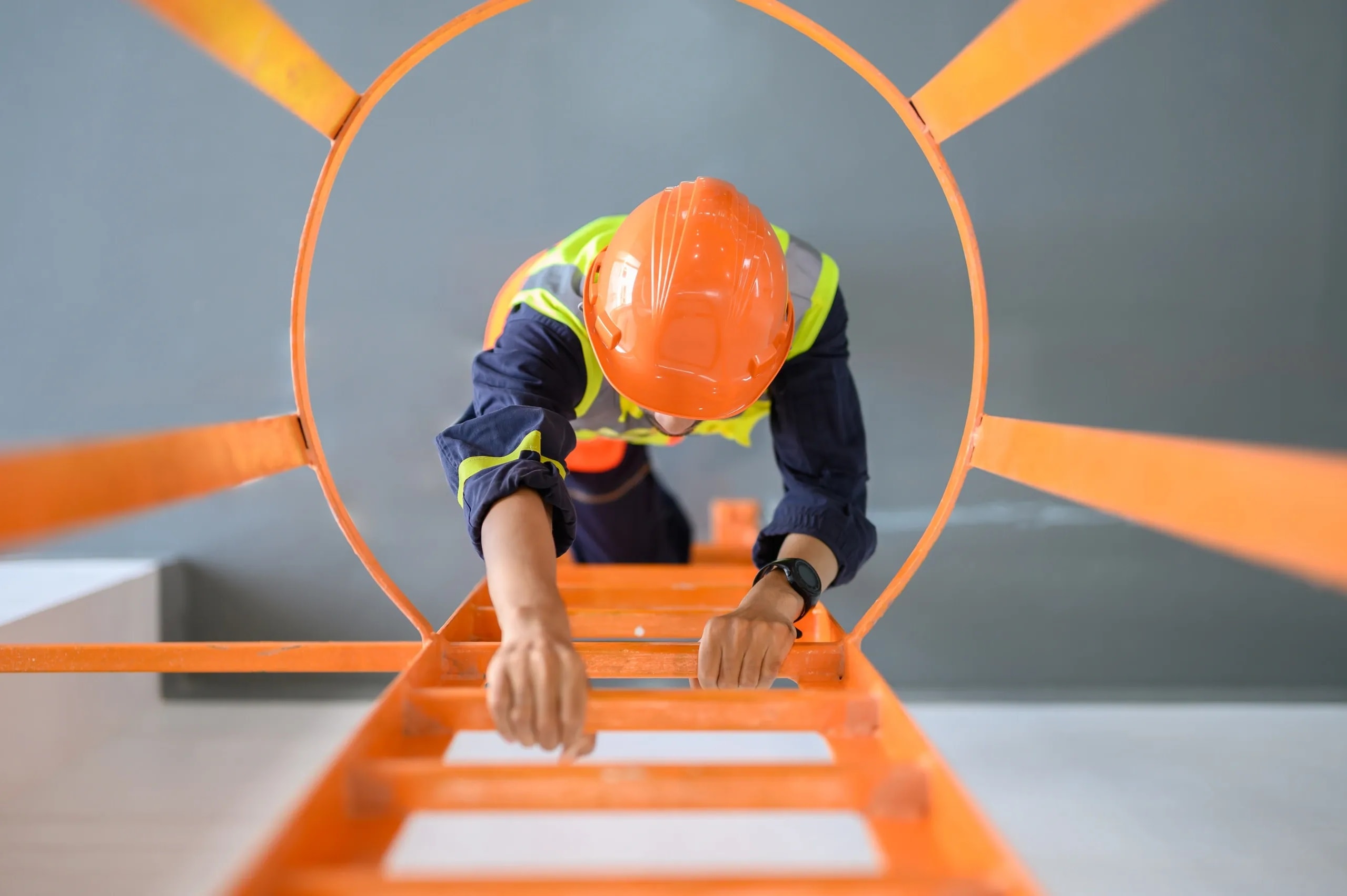 Safety inspector reviewing OSHA compliance on job site